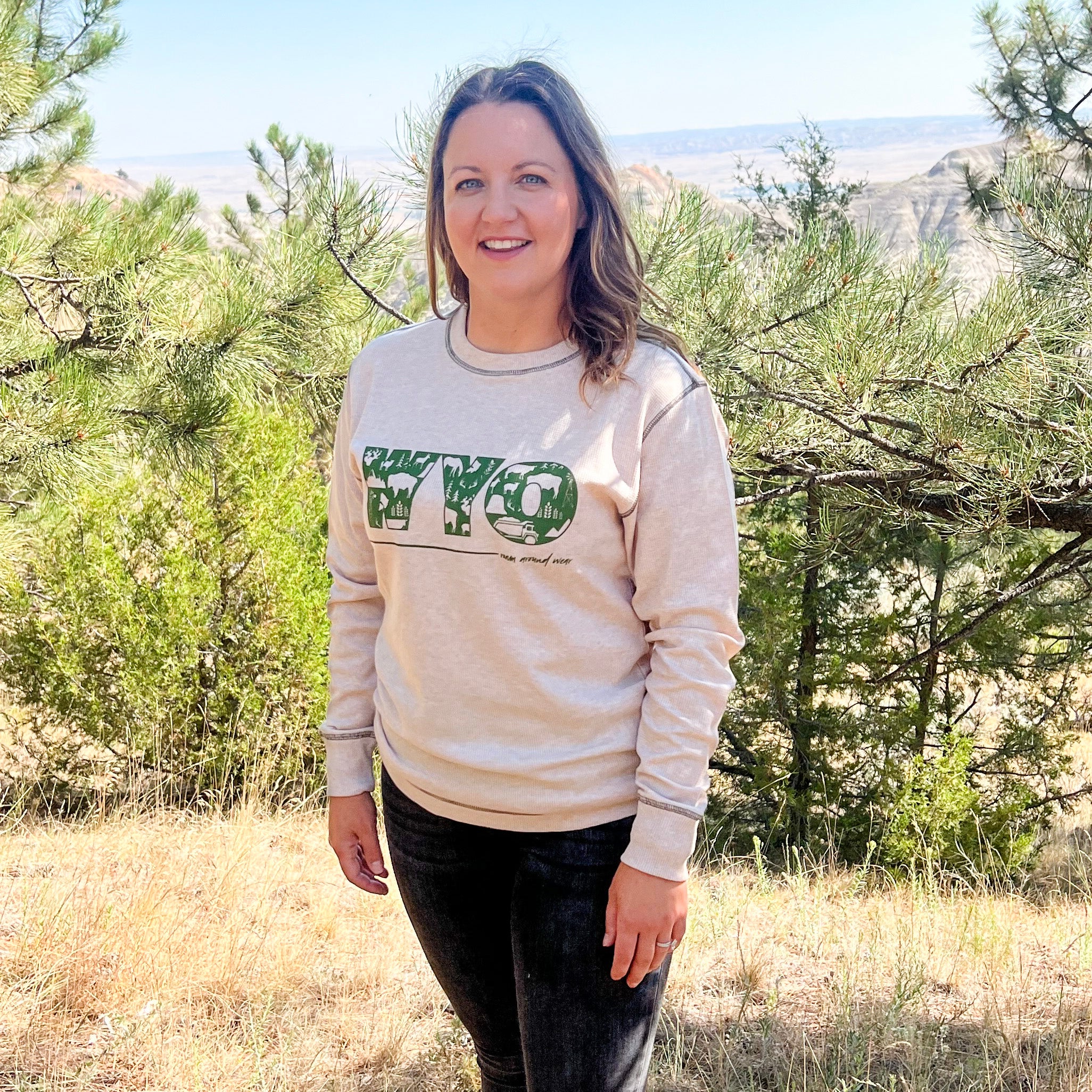 WYO icons on unisex long sleeve thermal. Roam Around Wear is a Wyoming t-shirt company based in Gillette, Wyoming