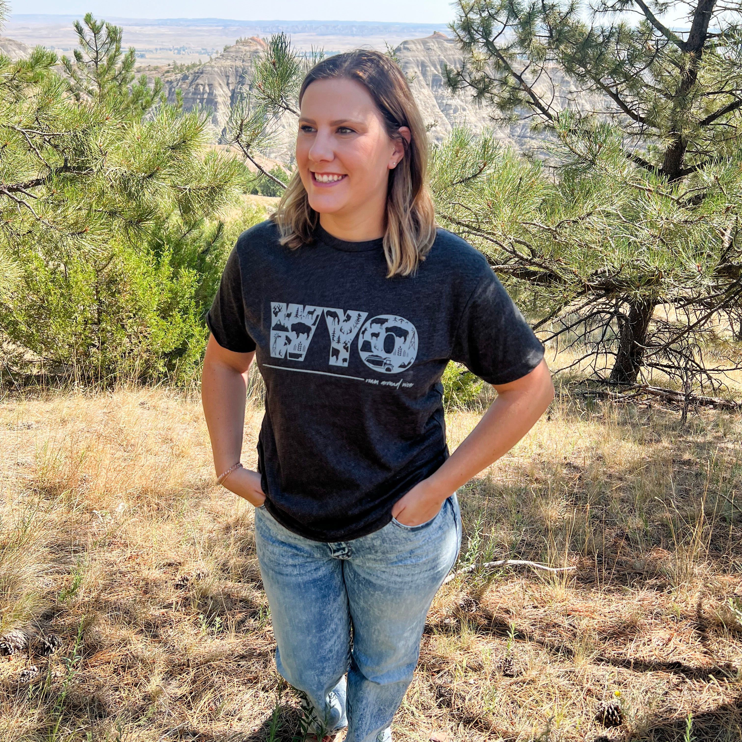 WYO icons on unisex gray tee. Roam Around Wear is a Wyoming t-shirt company based in Gillette, Wyoming