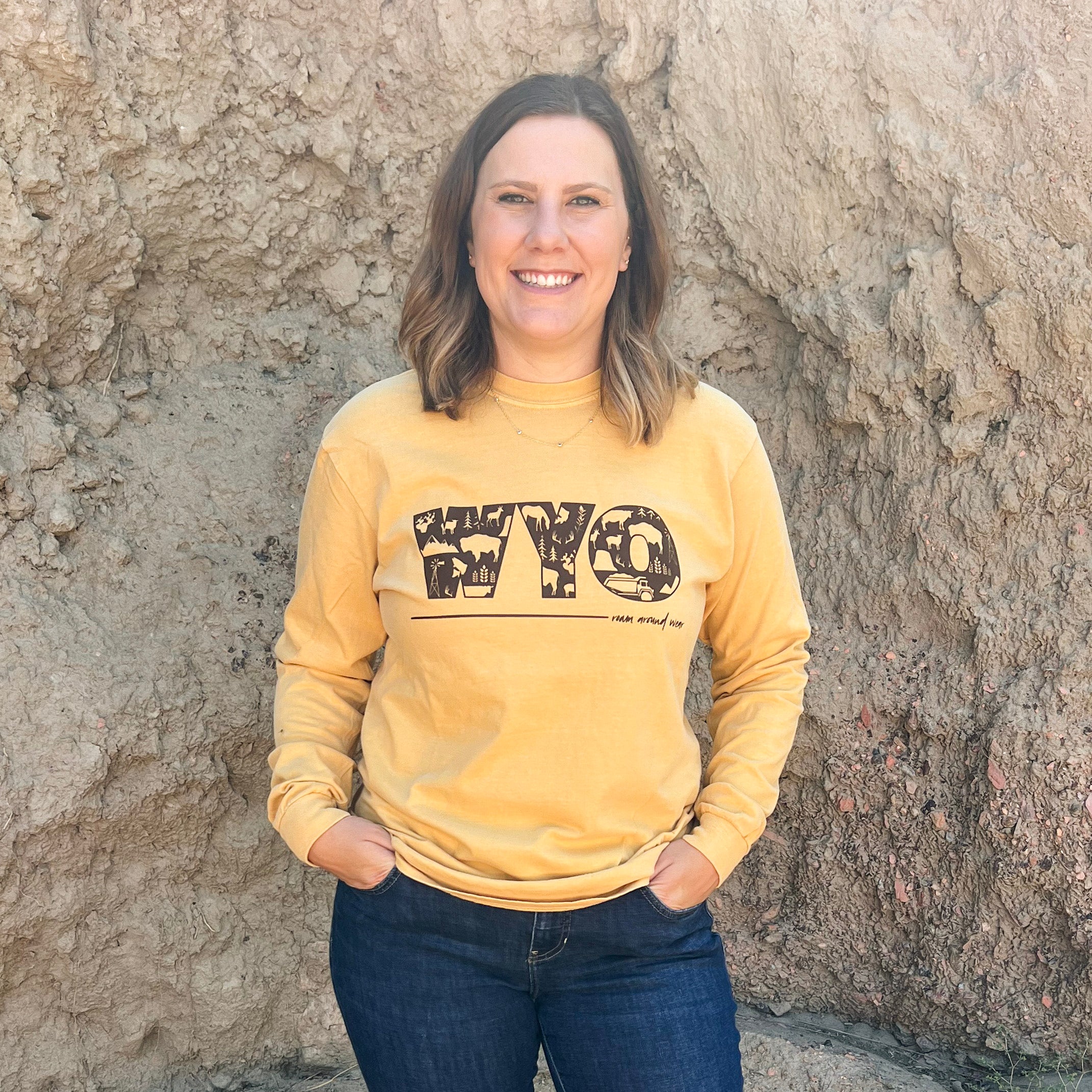 WYO icons on unisex long sleeve. Roam Around Wear is a Wyoming t-shirt company based in Gillette, Wyoming