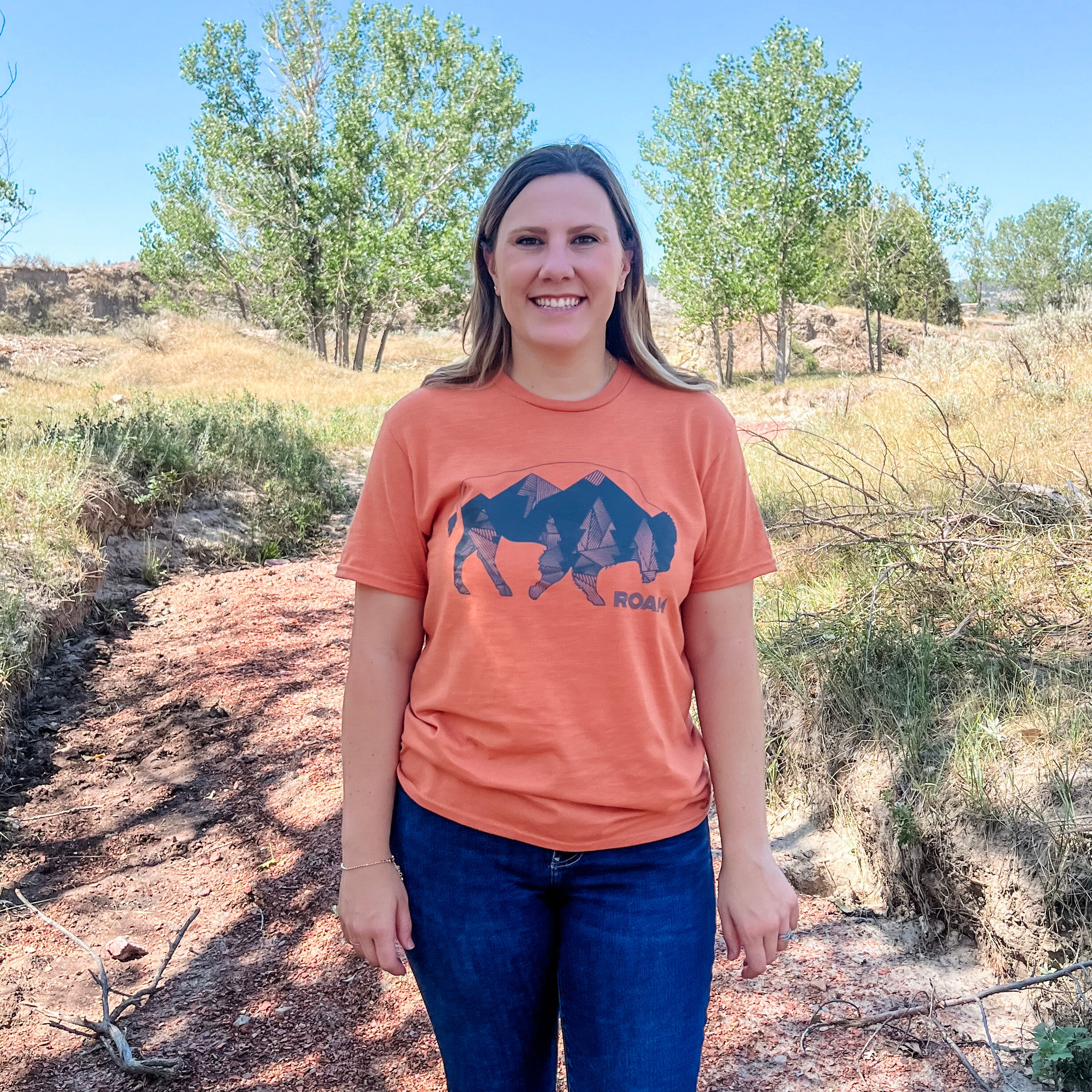 Geometric Tree Bison design in black on pepper tee. Roam Around Wear is a women owned Wyoming T-Shirt company based out of Gillette, Wyoming.