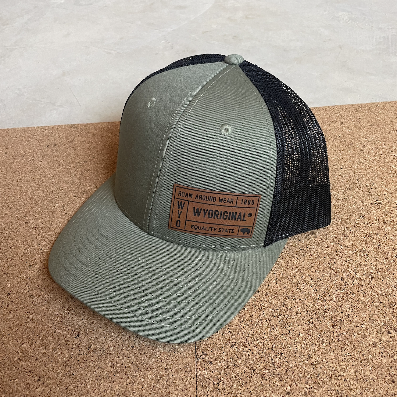 black and green WYORIGINAL hat. Wyoming trucker hat. Roam Around Wear is a Wyoming t-shirt company based in Gillette, Wyoming